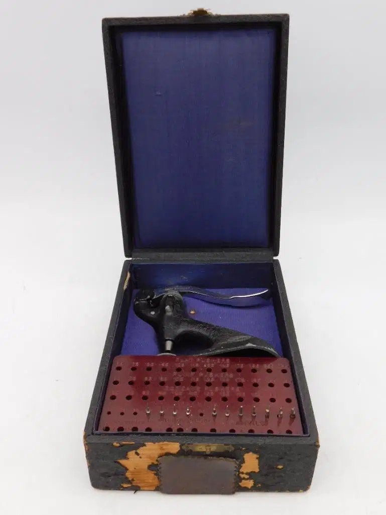 Seitz staking tool and punch tray displayed inside an open fitted case