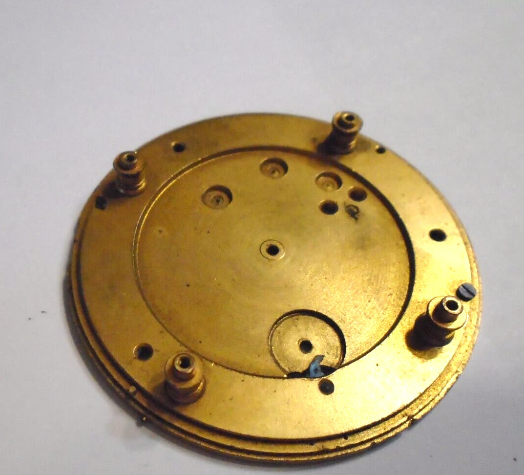 An Aurora pocket-watch plate offered as a separate component. Its seller attribution is retained rather than independently authenticated; construction is specific to this example.
