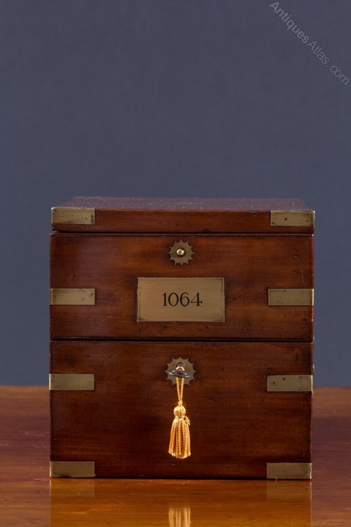 Exterior view of the closed brass-bound mahogany box of John Poole marine chronometer No. 1064