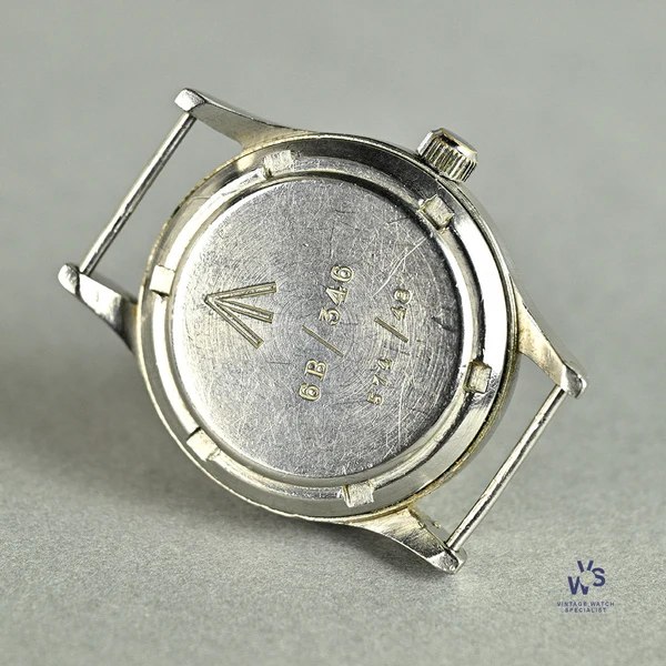 Case back of IWC Mark 11 wristwatch showing British military broad arrow, 6B/346 stores reference, and 575/48 issue number
