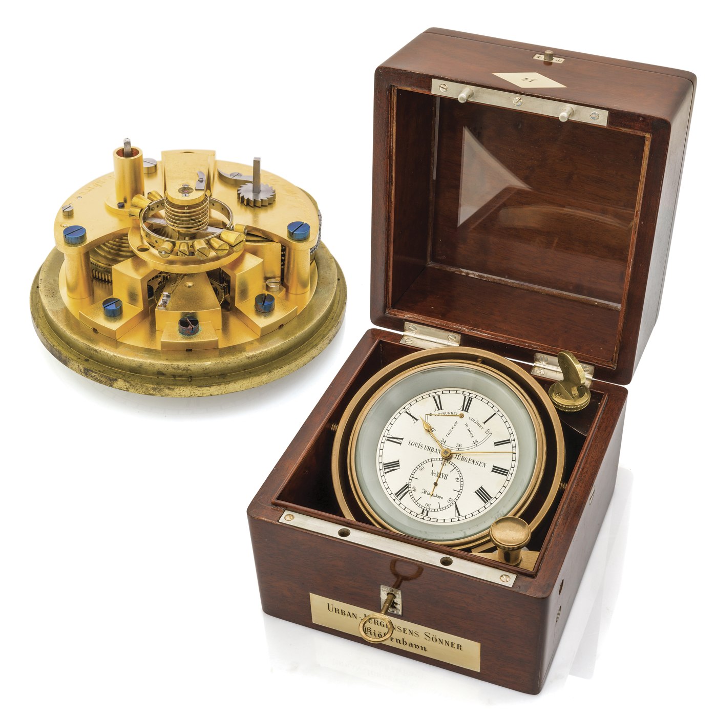 The Louis Urban Jurgensen deck chronometer, shown with its mahogany box and internal brass bowl, accompanied by a view of the movement.