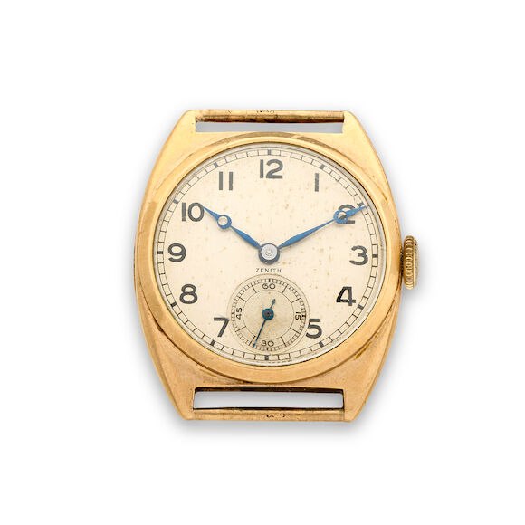 Front view of the Zenith 9K gold tonneau-form wristwatch case and dial