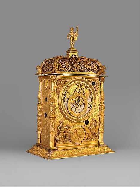 Front view of the astronomical table clock, showing the astrolabe dial and subsidiary planetary indicators.