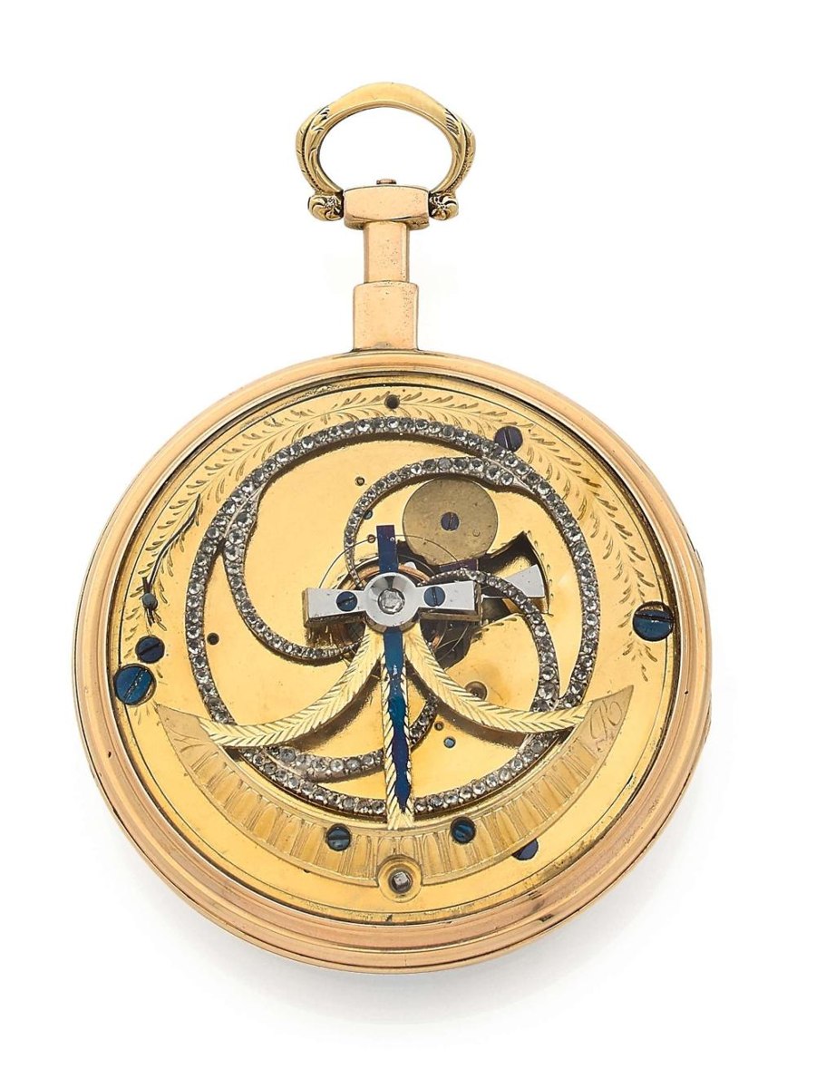 Exhibition case back showing the gilt movement and stone-set Pouzait-type balance wheel
