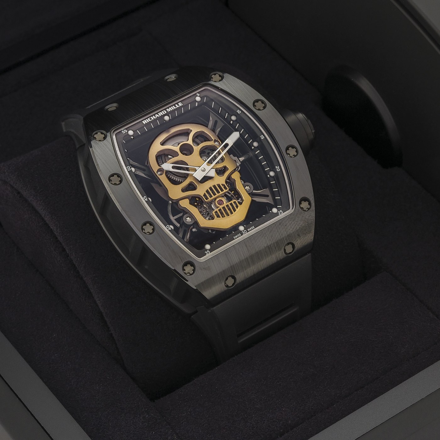 Front view of the Richard Mille RM 52-01 Skull Nanoceramic watch showing the 5N gold skull dial and tourbillon cage.