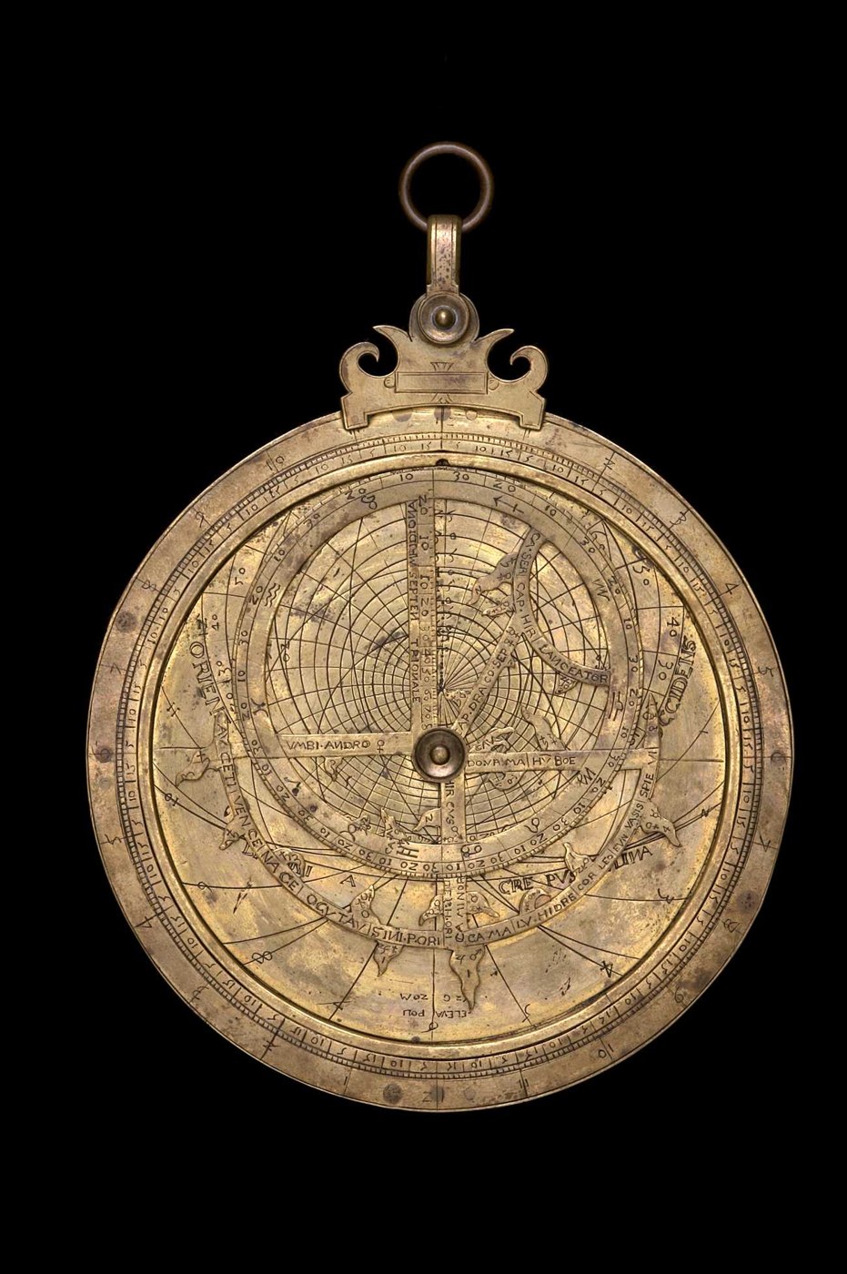 Full view of the astrolabe front showing the rete, mater, throne, shackle, and ring.