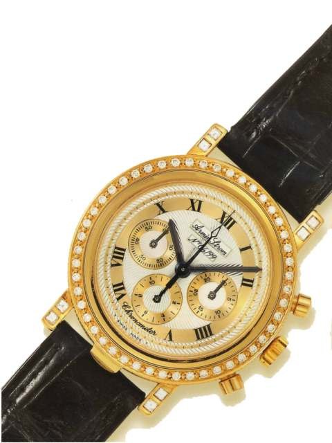 Front view of the Armin Strom chronograph wristwatch showing the diamond-set bezel, fluted case band, and guilloché dial with three registers.