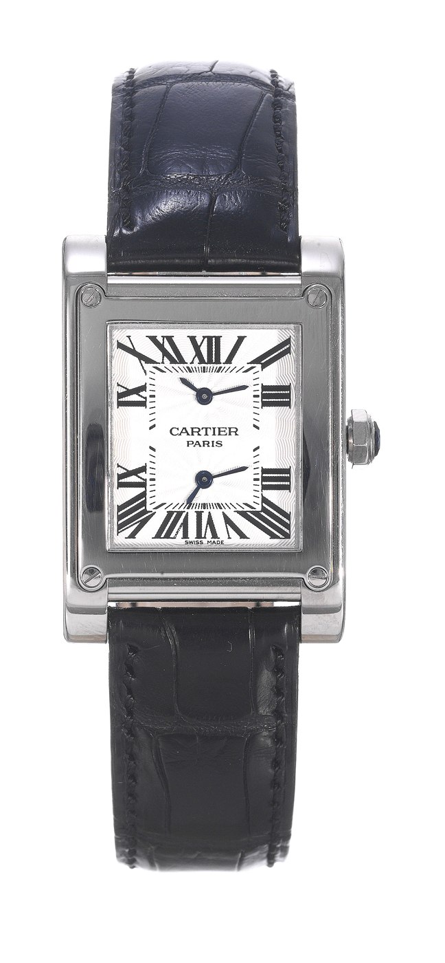 Front view of the Cartier Tank à Vis, showing the guilloché dial with two time zone displays, blued steel hands, and 18K white gold case.