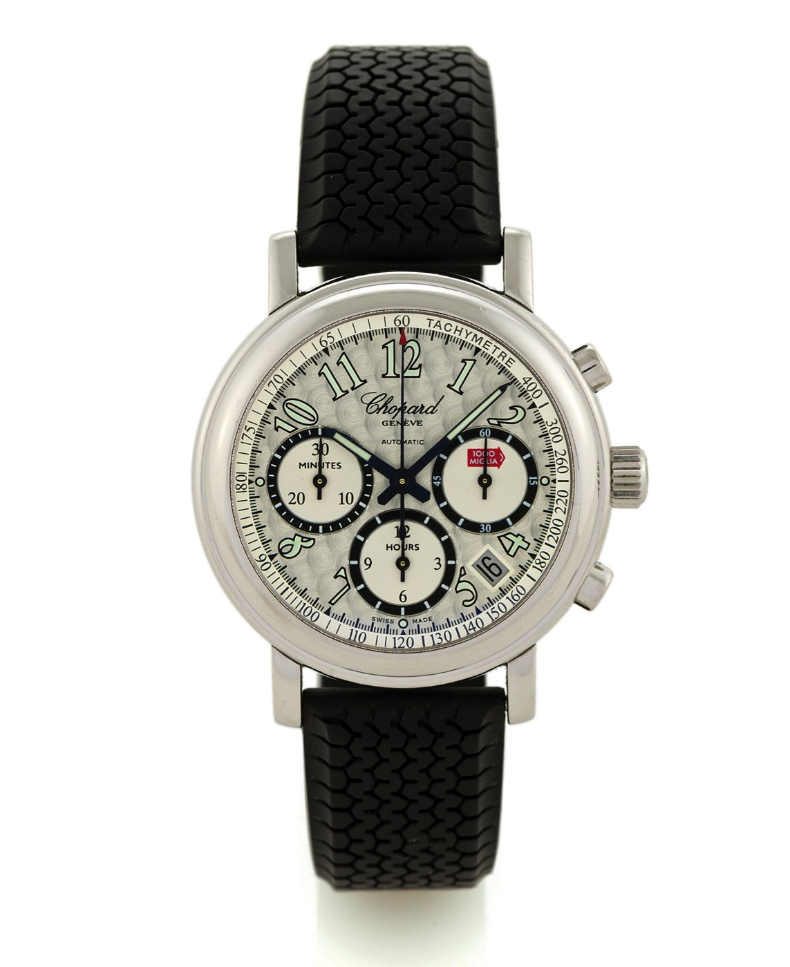 Chopard 1000 Miglia Chronograph in stainless steel with silver guilloché dial and tire-tread pattern rubber strap.