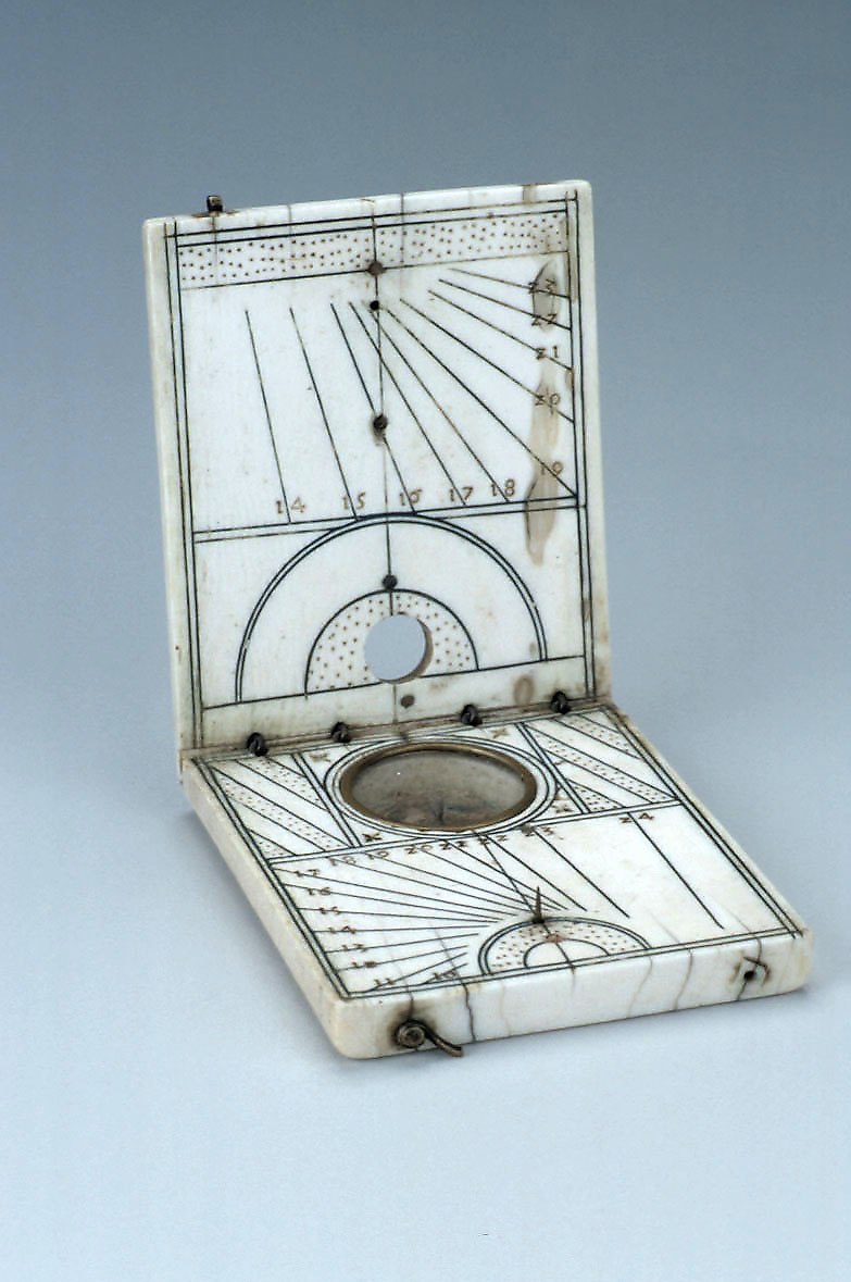 Detailed view of the interior faces and the compass recess of the diptych dial.