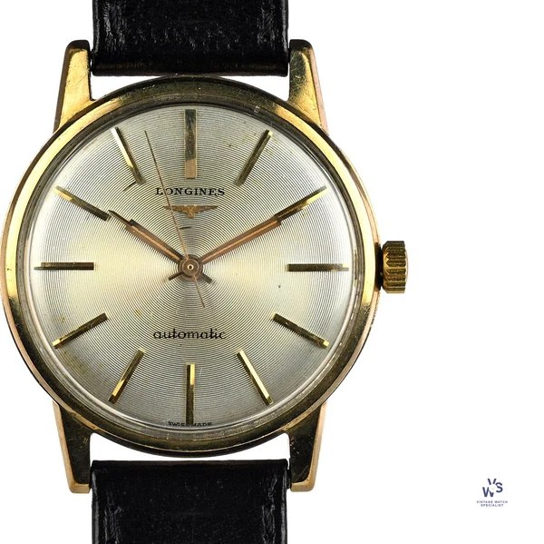 Front view of the Longines 9k gold automatic wristwatch with concentric textured silver dial