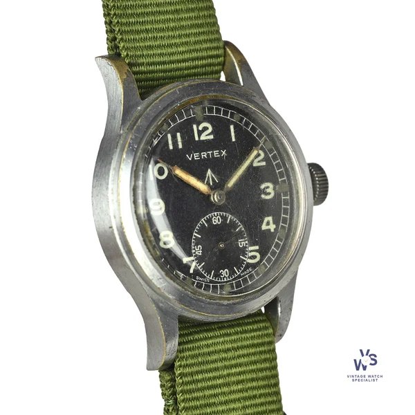 Three-quarter front view of the Vertex W.W.W. military wristwatch on a green textile strap