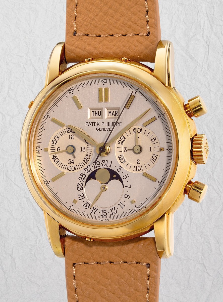 Front view of the Patek Philippe reference 3970 perpetual calendar chronograph wristwatch showing dial, gold case, and strap.