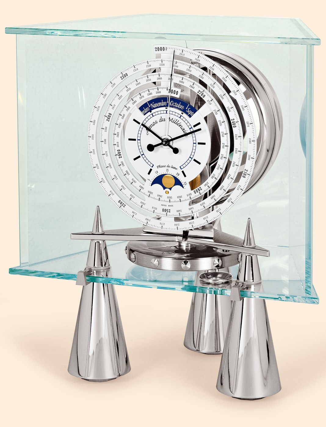 The Atmos du Millenaire 'Atlantis' showing the 1000-year spiral scale, moon phase aperture, and the conical steel supports.