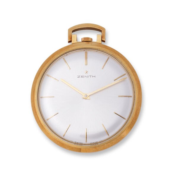 Front view of the open face Zenith pocket watch showing the silvered dial, gold case, and bow