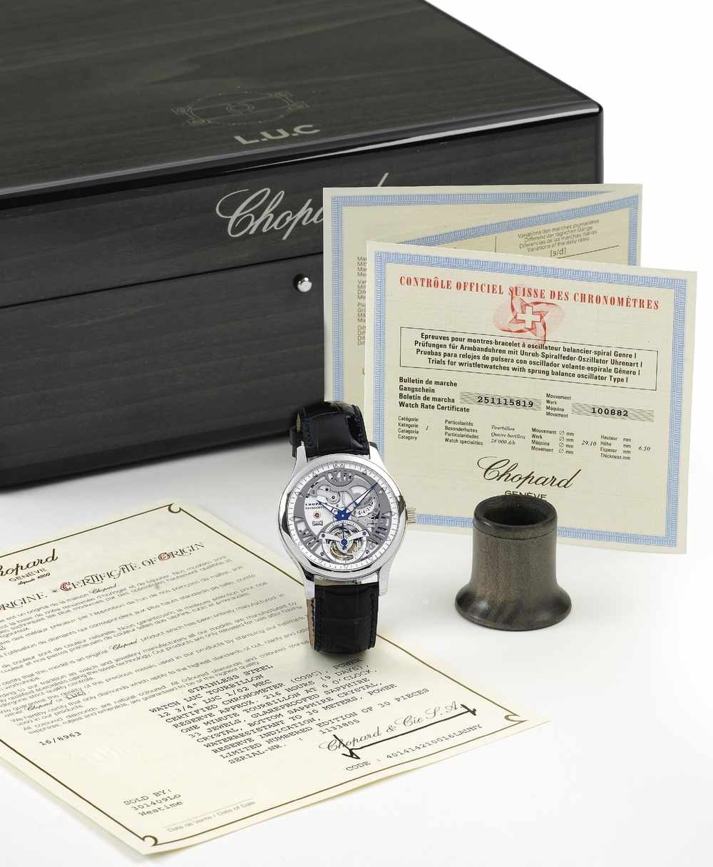 The Chopard L.U.C. Steel Wings 9-Day Tourbillon accompanied by its box, certificate, and loupe.