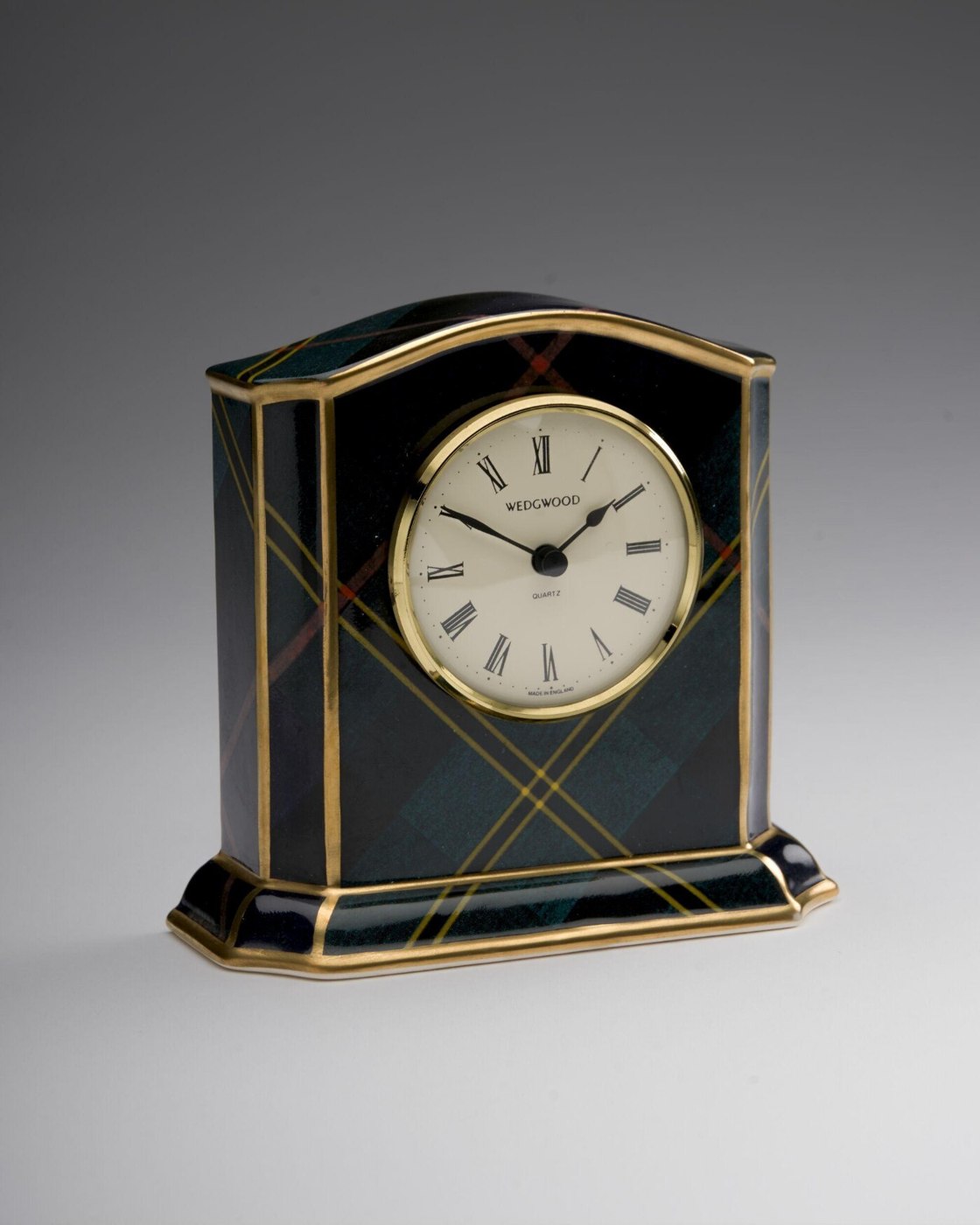 View of the back of the Clarendon mantle clock showing the gilded maker's marks, Ralph Lauren branding, and the cream earthenware finish.