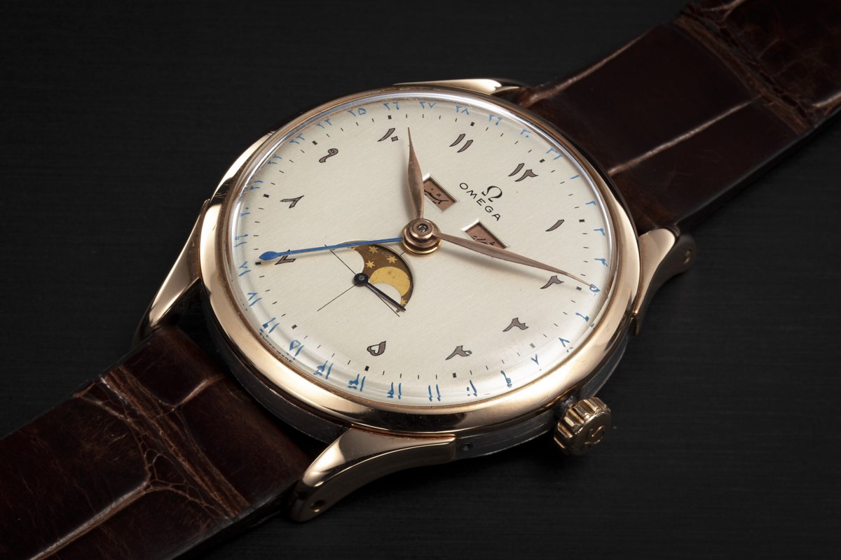 Oblique view of the Omega Cosmic ref. 2606-8 dial and two-tone case on a leather strap