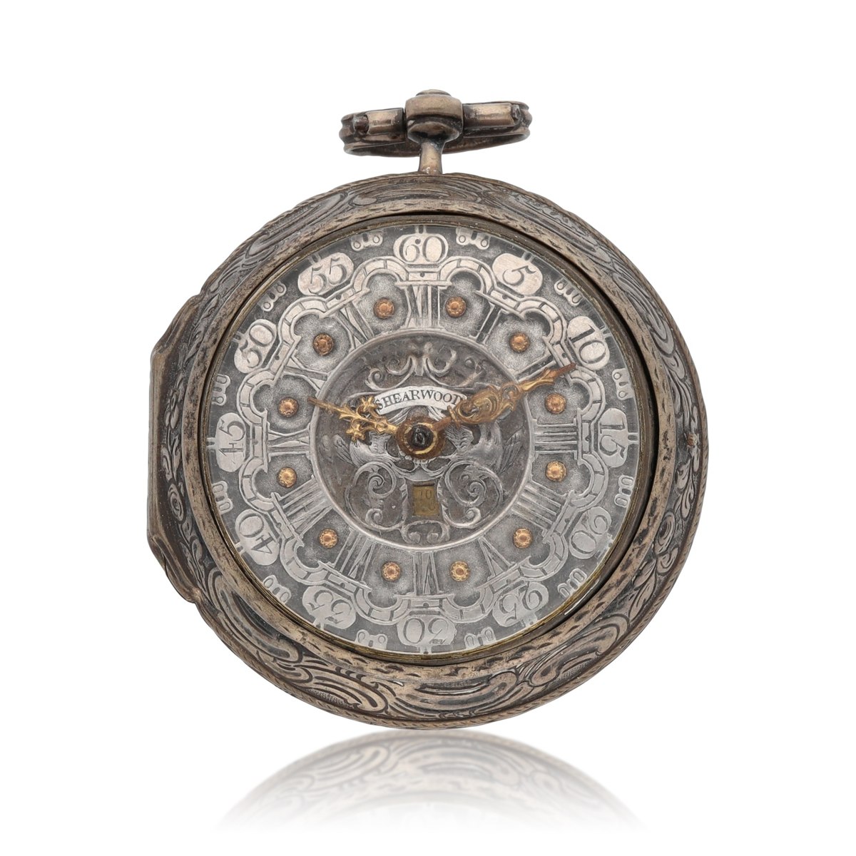 Dial and front view of the silver pair cased watch within its engraved outer bezel