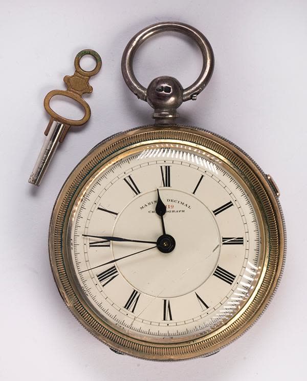Dial and front view of the Marine Decimal Chronograph pocket watch with separate key