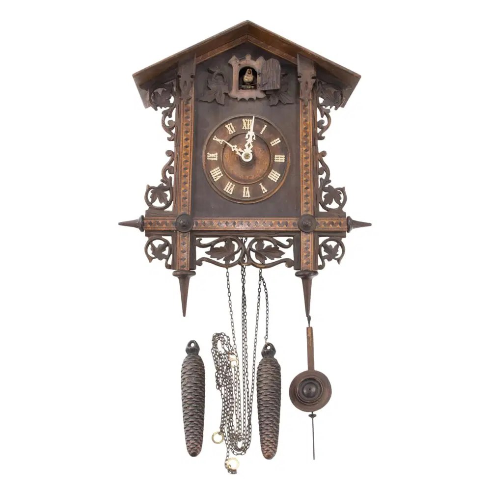 Front view of the Black Forest marquetry decorated cuckoo clock with weights, chains, and pendulum displayed below