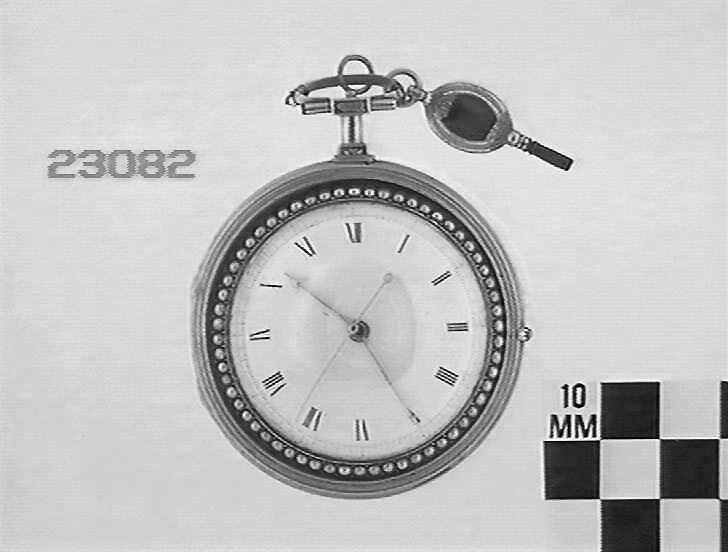 Gilt pair case pocket watch with winding key