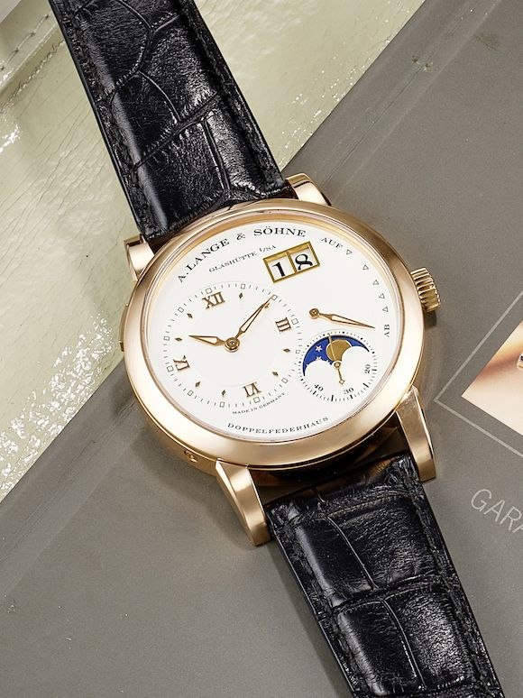 Dial and front view of the A. Lange & Söhne Lange 1 Moon Phase ref. 109.032 in pink gold on a leather strap