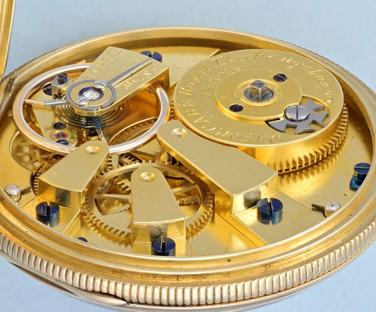 View of the gilt Lepine calibre bar movement, signed barrel, and ribbed case edge