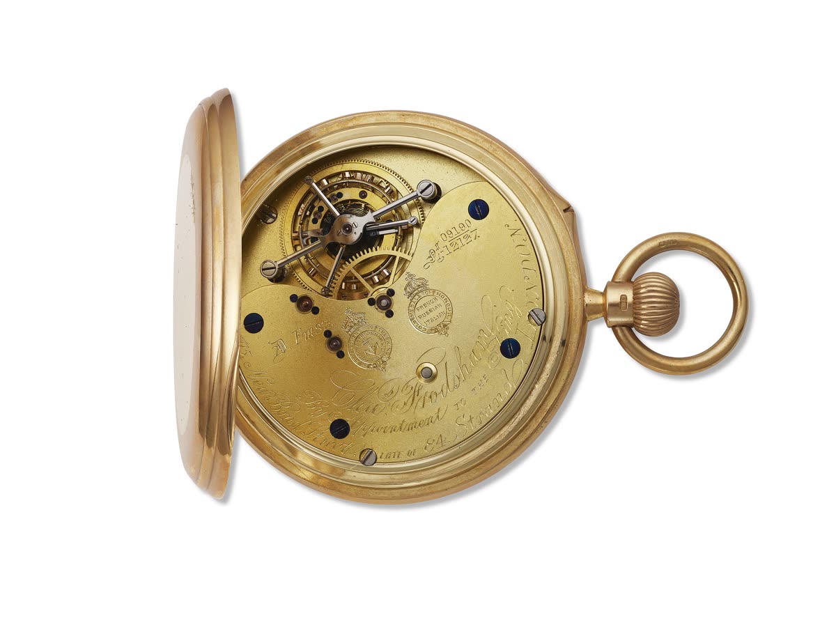Movement view of the Charles Frodsham pocket watch showing the six-minute tourbillon cage, frosted gilt plate, and pendant bow