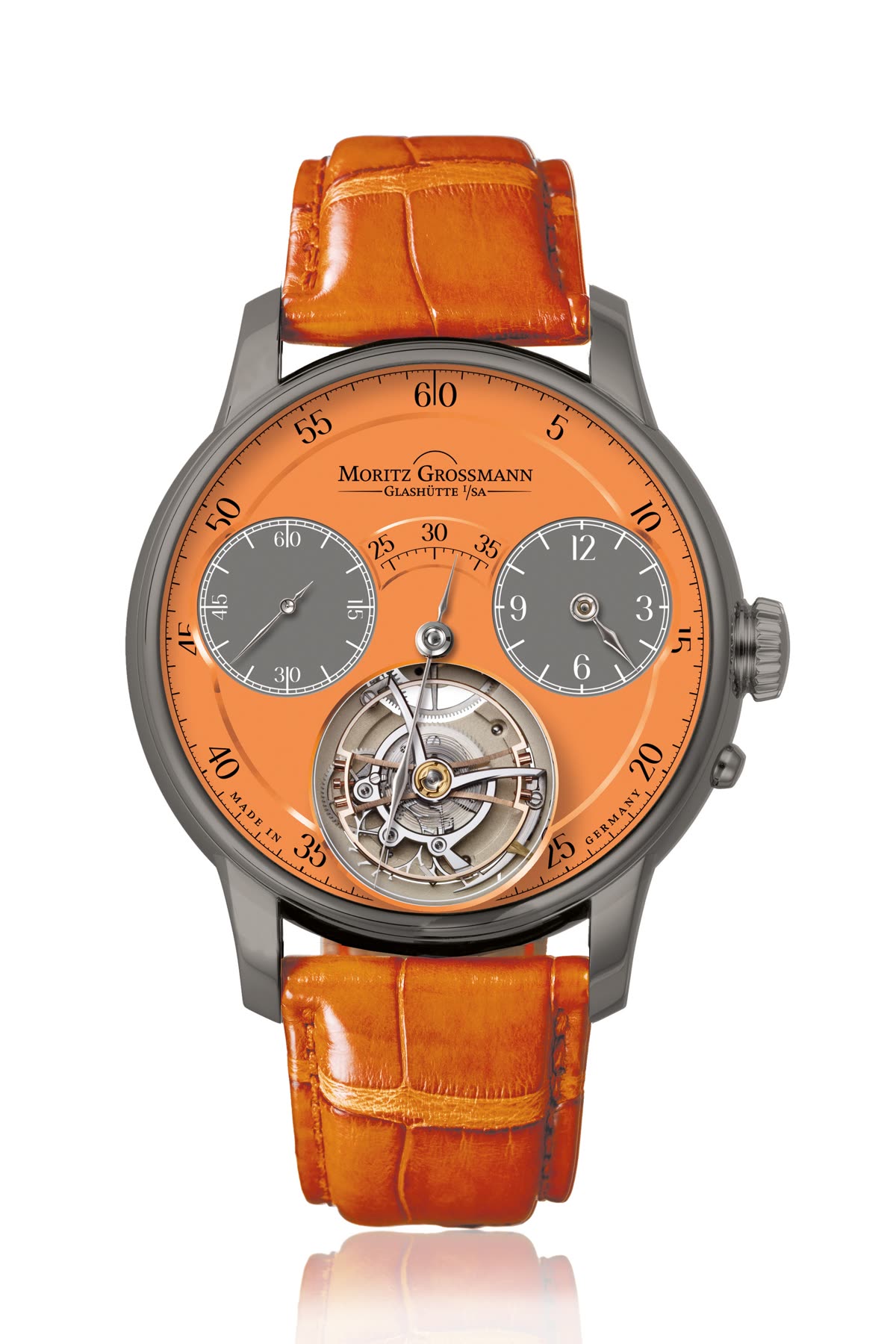 Front view of the Moritz Grossmann Benu Tourbillon Orange Titanium showing dial layout, tourbillon aperture, and orange strap