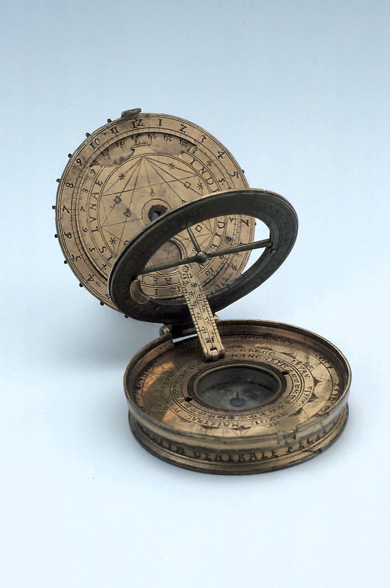 General view of the astronomical compendium in open position, showing the nocturnal, lunar volvelle, sundial, and compass.