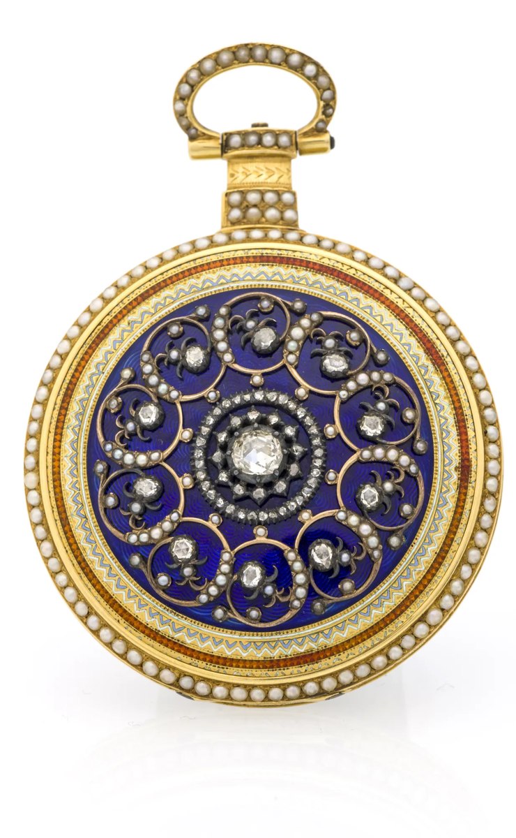 Back view of the 18K gold pocket watch case showing blue guilloché enamel, diamond rosette, and pearl borders