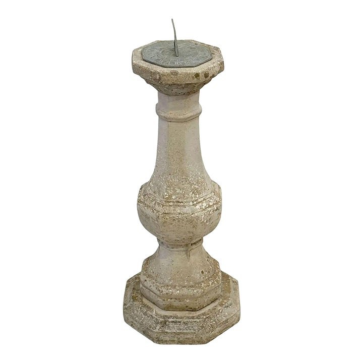 Full view of the composition stone pedestal and bronze sundial