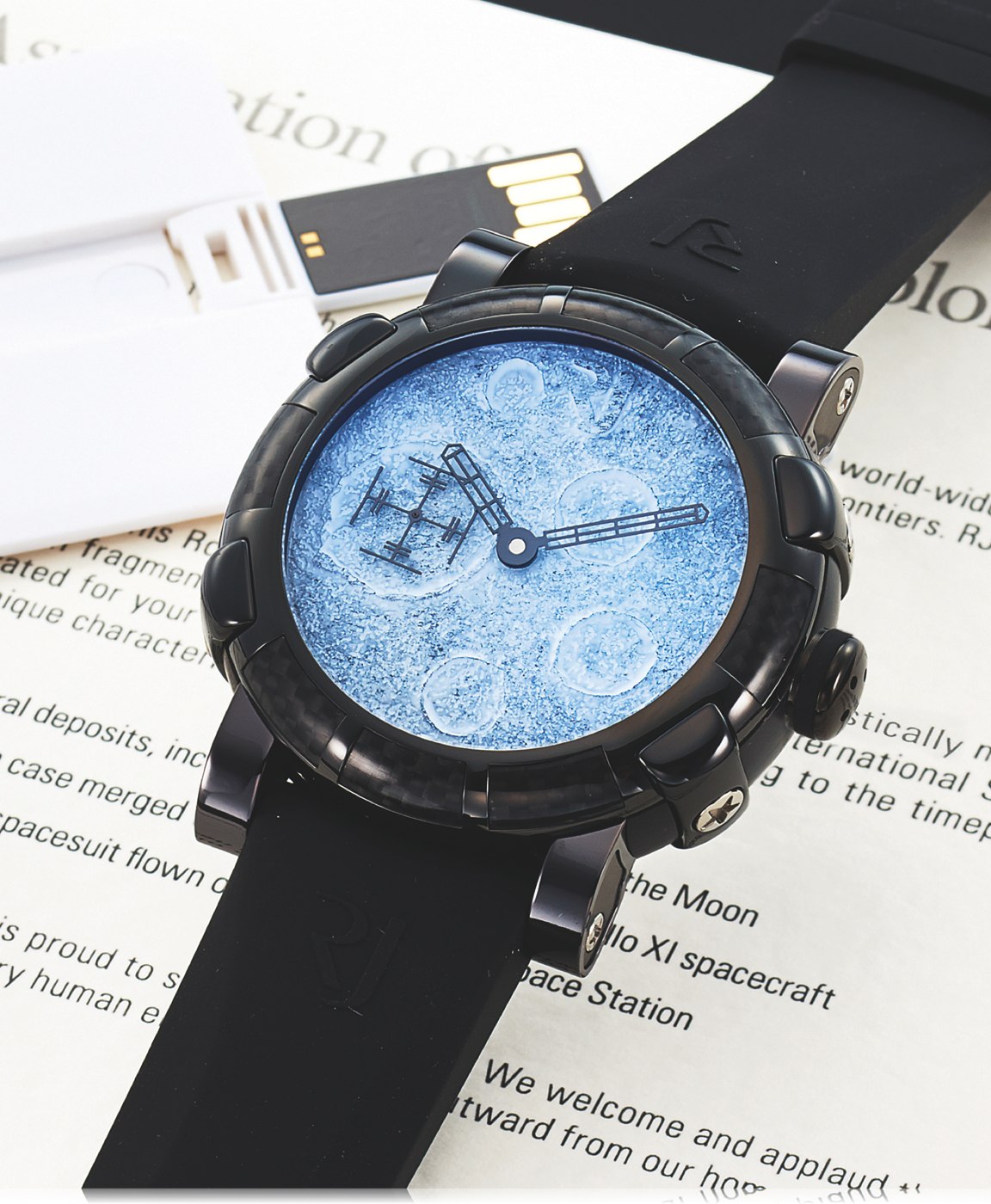Romain Jerome Moon Dust DNA watch featuring a textured lunar-style dial and carbon-coated bezel.