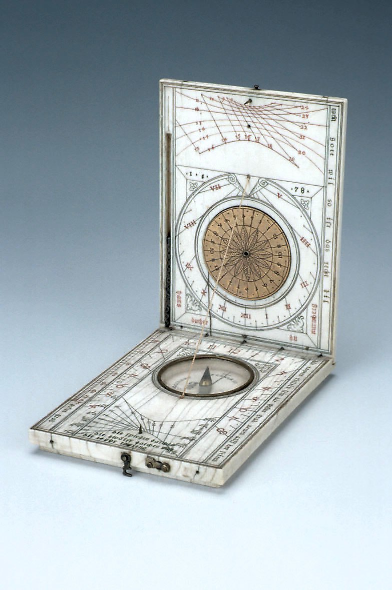 Diptych dial by Hans Tucher, 1578, showing the internal configuration of the ivory leaves, the compass, and various gnomon scales.
