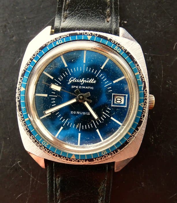 Front view of Glashütte GUB Spezimatic wristwatch with blue dial and world time bezel