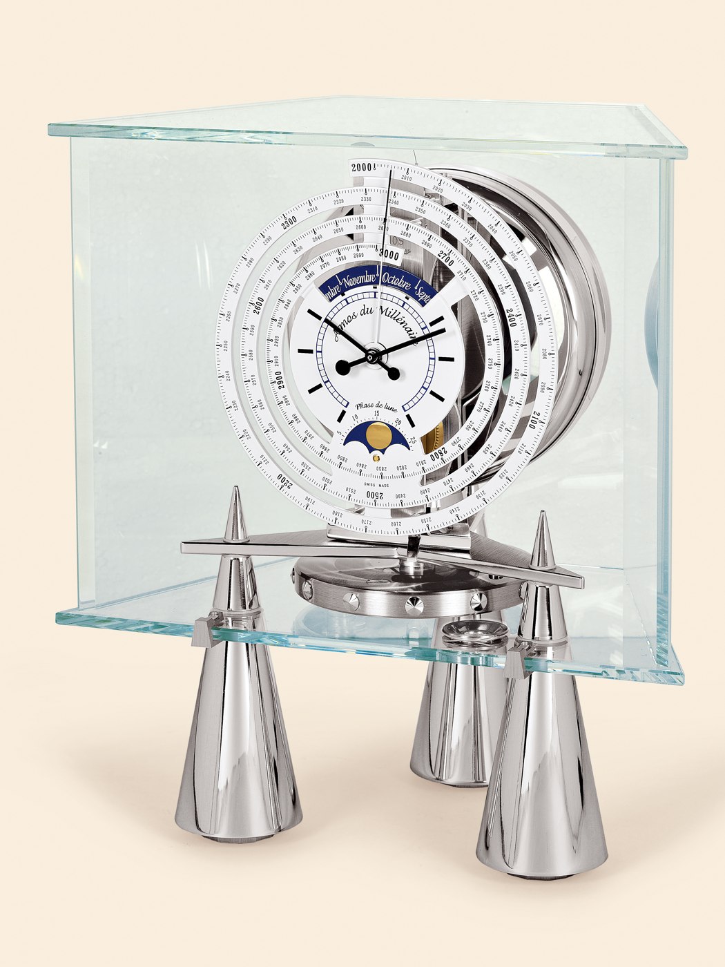 Frontal view of the Jaeger-LeCoultre Atmos du Millénaire 'Atlantis' clock showing the dial, lunar calendar, and glass housing.