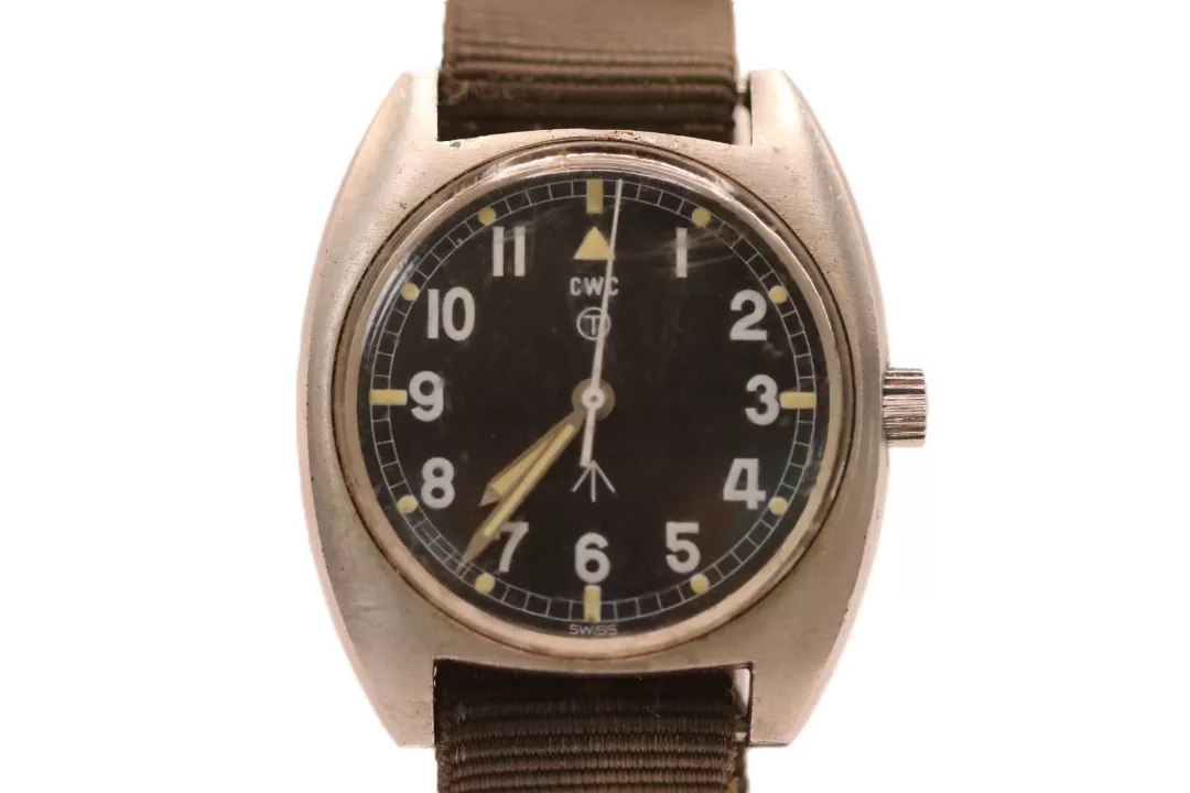 Frontal view of the CWC military wristwatch showing dial, hands, and strap
