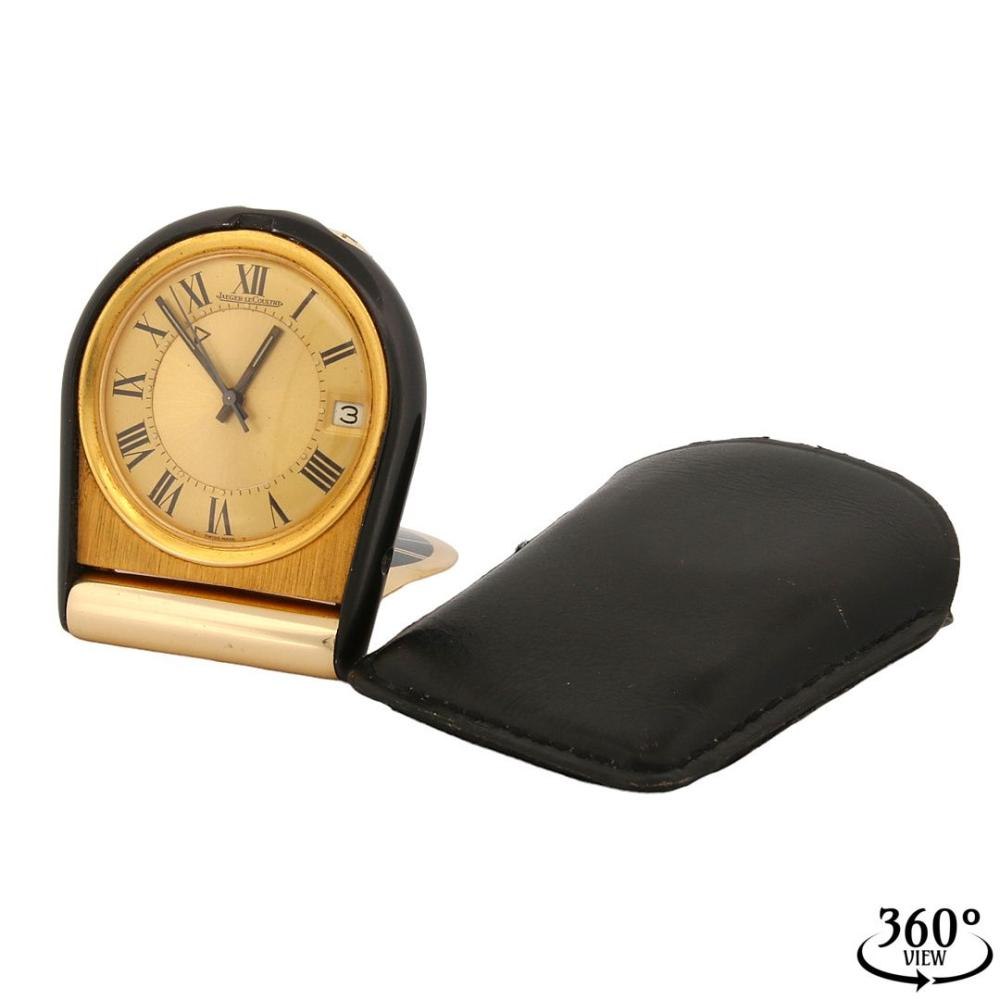 Jaeger-LeCoultre Memovox travel alarm watch in hinged case, shown with original carrying bag.