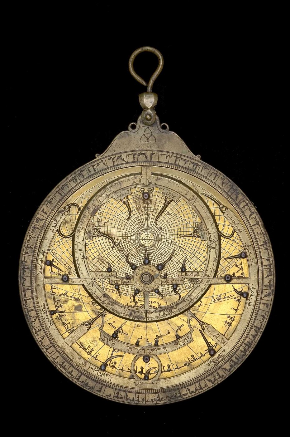 Front view of the astrolabe (inventory 50934) showing the rete, throne, and degree scale.