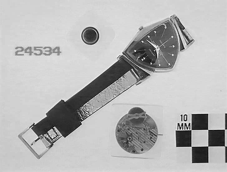 Hamilton Electric wristwatch with detached battery and movement mechanism, registration number ST 24534.