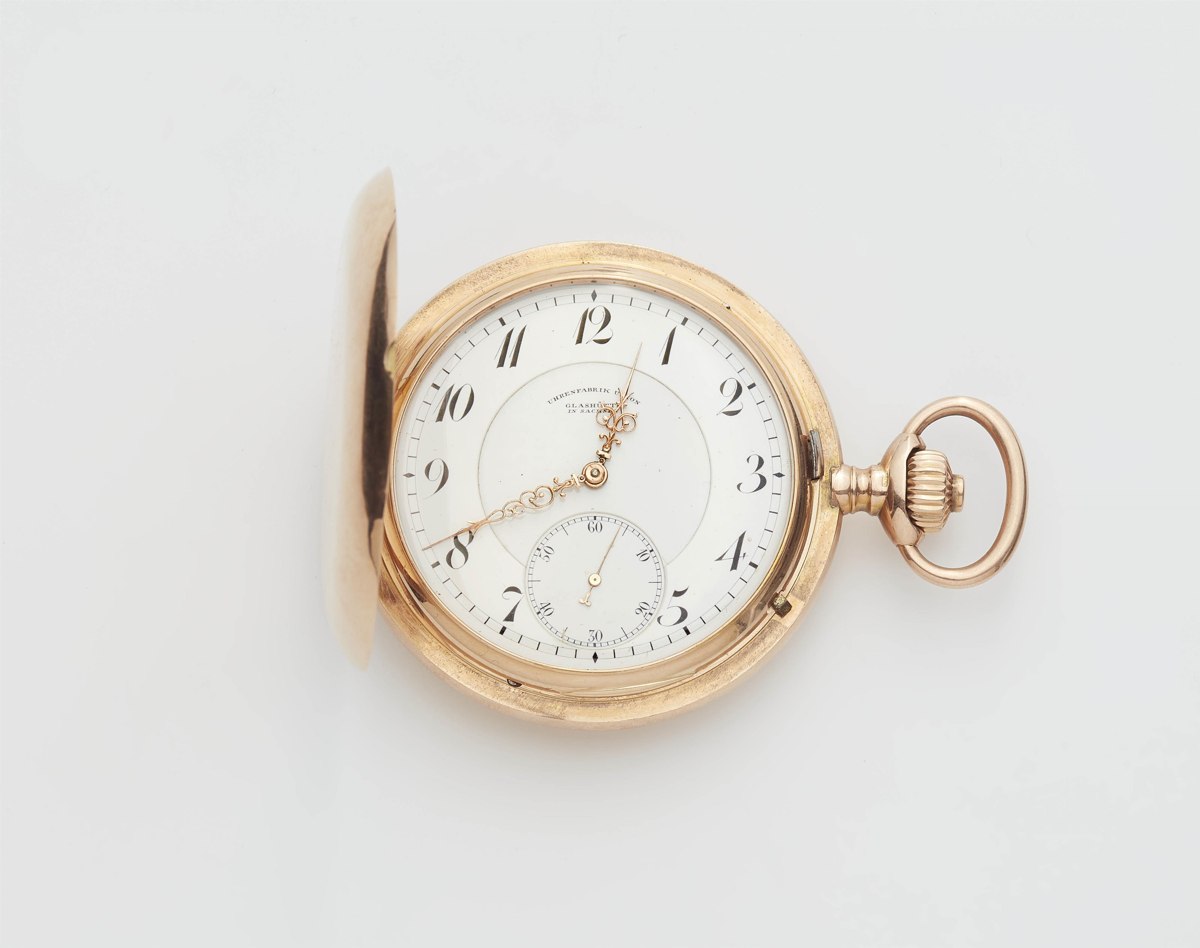 Front view of the Uhrenfabrik Union Glashütte 14k gold hunter pocket watch with the front cover open
