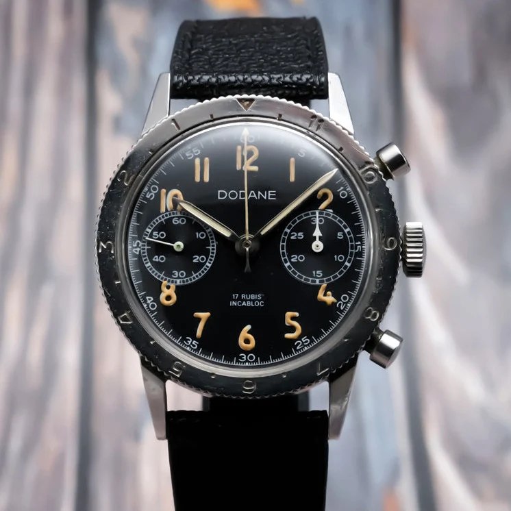 Front view of the Dodane Type 21 flyback chronograph wristwatch on a black strap