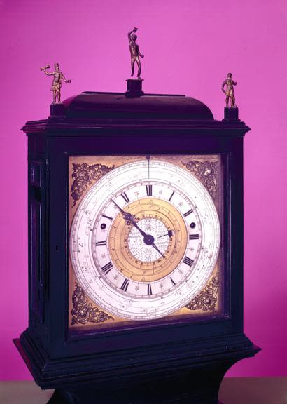 Astronomical pedestal clock by Samuel Watson in an ebonised case