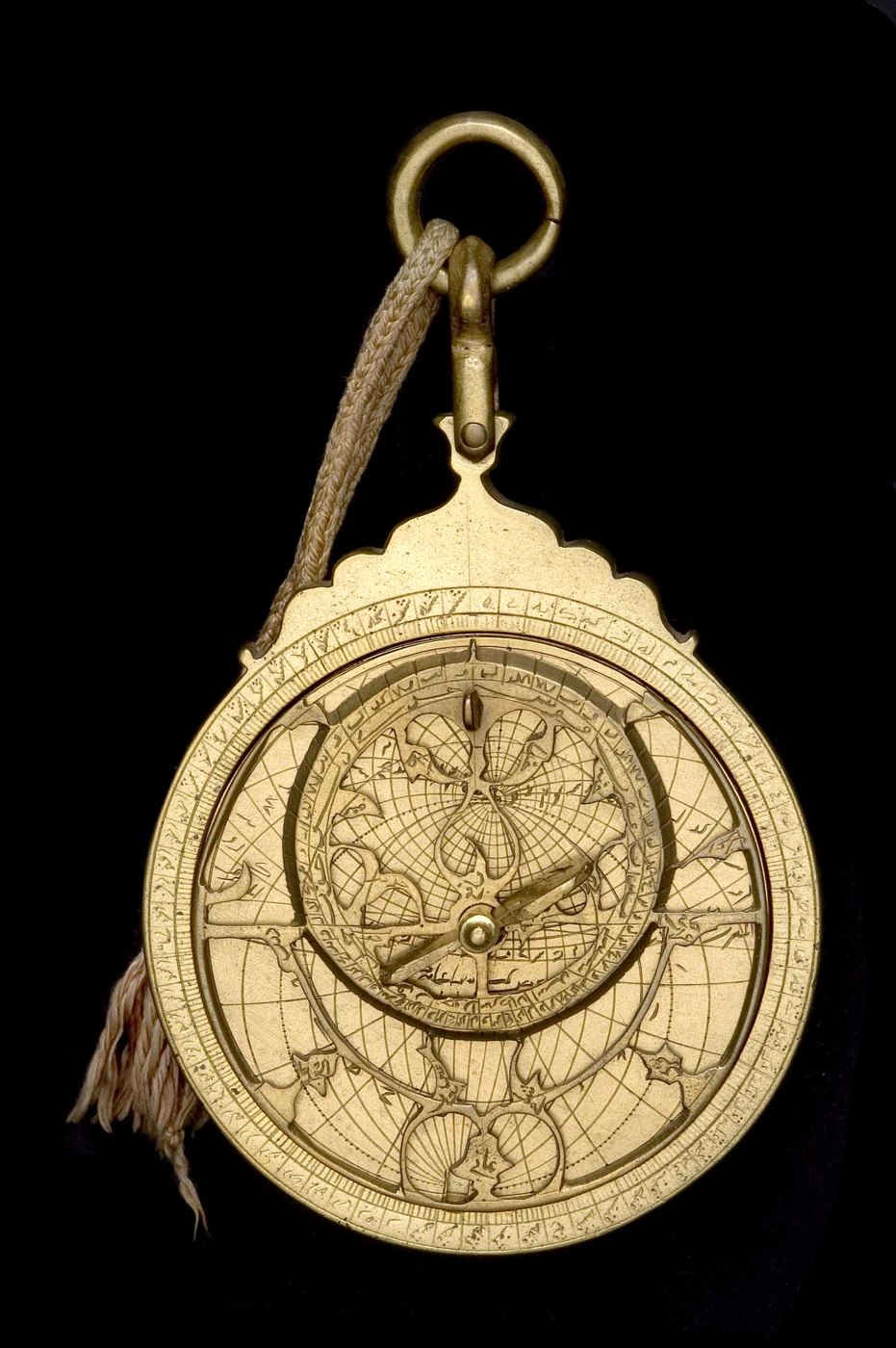 Full view of the front of the astrolabe showing the rete, pin, and horse attachment.