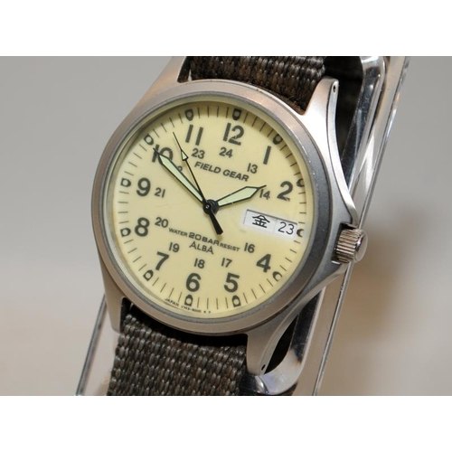 Front view of the Seiko Alba Field Gear wristwatch reference V743-8000 mounted on a display stand