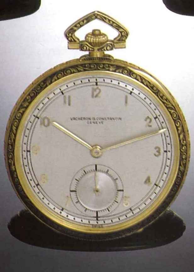 Front view of the Vacheron & Constantin gold and enamel pocket watch showing the silver dial and decorative bezel.