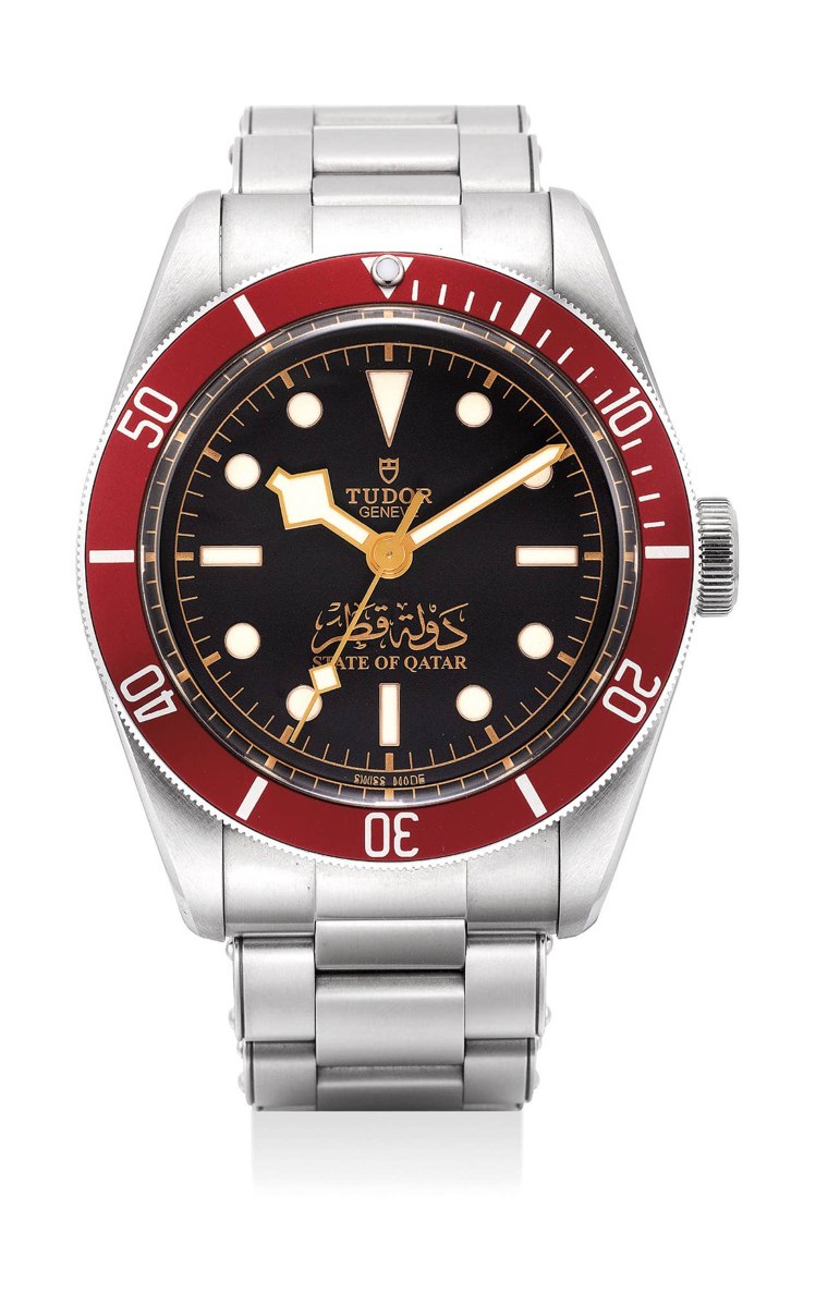 Front view of Tudor Heritage Black Bay Ref. 79230R with State of Qatar dial inscription and burgundy bezel