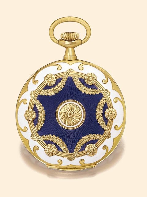 18K gold and enamel keyless dress watch with floral and laurel-leaf decoration.