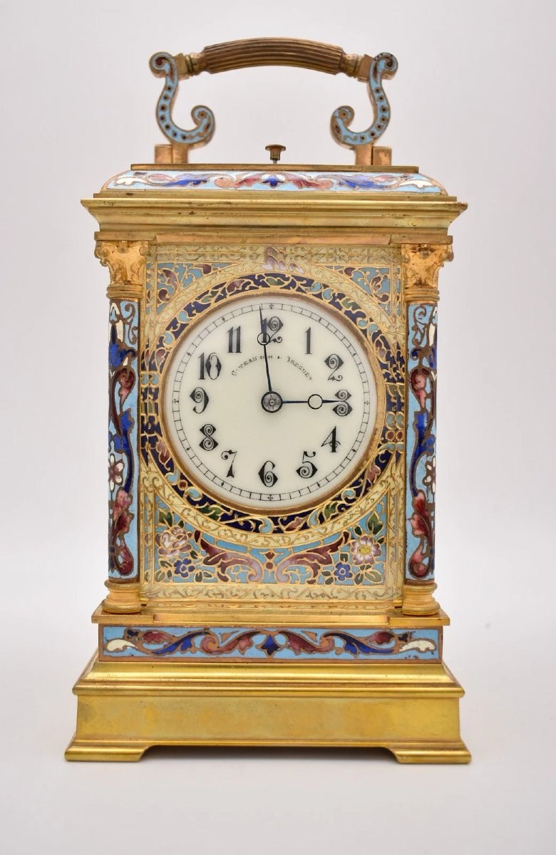 Front view of the Giteau carriage clock with champlevé enamel decoration